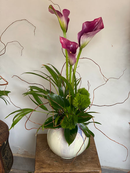 Calla and twigs arrangement