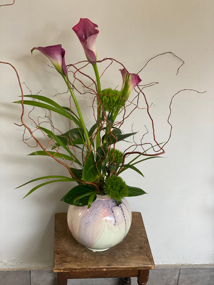 Calla and twigs arrangement