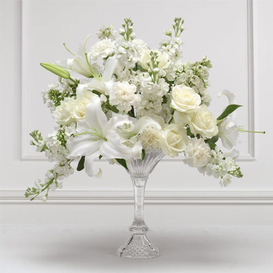 Classic white arrangement in the glass vase